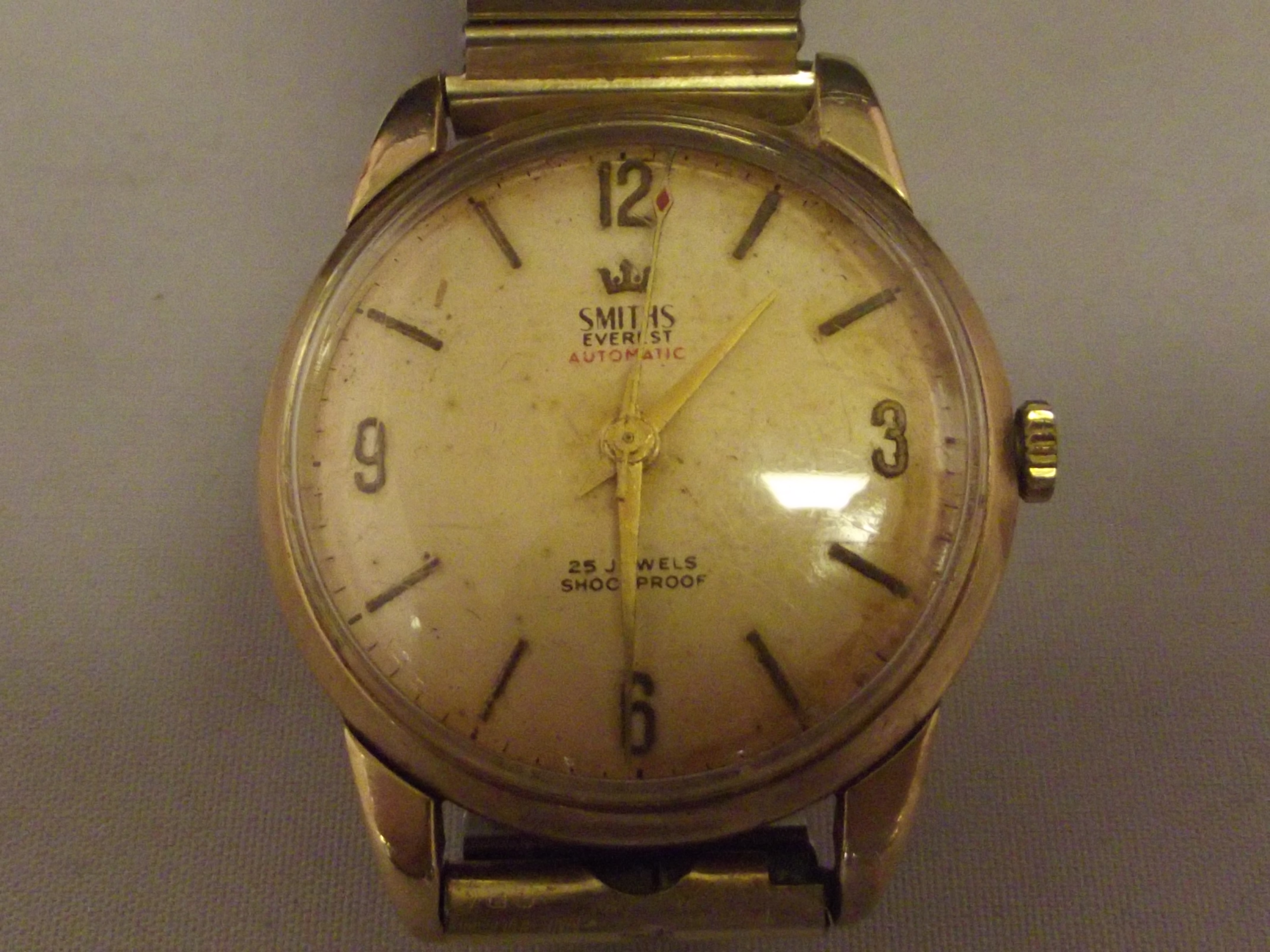 A vintage Smiths Everest automatic wrist watch with 9ct gold case.