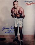 WALCOTT JERSEY JOE: (1914-1994) American Boxer, World Heavyweight Champion 1951-52. Signed colour