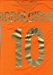 RONALDINHO: (1980- ) Brazilian Footballer. An orange souvenir Nike FC Barcelona football jeresy,