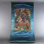 A LHAMO THANGKA: Tibet, 19th century Pigment with silver on cotton, the fierce goddess depicted in