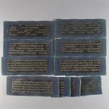 A BOOK ON BLACK GROUND: Tibet, 19th century gold lettering on lacquered card, 45 leaves, five lines