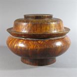 A TSAMPA BOWL AND COVER: TIbet, 19th century Turned burr walnut, of bun shaped form on shallow