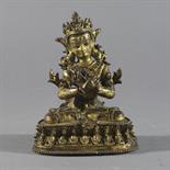 A GILT BRONZE FIGURE OF VAJRADHARA, Nepal, 15th/16th century Seated on a double lotus throne, his