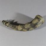 A CARVED RITUAL HORN, Nepal, 18th/19th century with hammered metal fittings depicting various Hindu