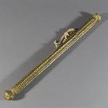 A GILT IRON PEN CASE, Probably Derge, Eastern Tibet, 17th/18th century Of faceted cylindrical form,