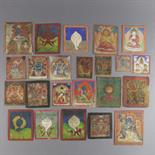 A COLLECTION OF TWENTY-THREE TSAKLIS, Tibet, 18th-19th century pigment on cloth and card, depicting