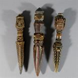 THREE WOOD PHURBUS, Tibet, 18th-19th century Each with three-sided blades, two with triple head
