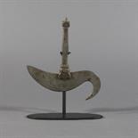 AN IRON RITUAL CHOPPER (karttrka), Tibet, 19th century Of crescent shaped form, hooked at one end,