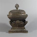 A COPPER REPOUSSE KAPALA, Tibet, 19th century In the form of a skull bowl, the elaborately