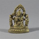 A SMALL BRASS FIGURE OF PADMASAMBHAVA, Tibet, 19th century Seated on a lotus base, flanked by his
