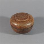 A TURNED BURR WOOD BOWL AND COVER, Tibet, 19th/early 20th century Of plain, flattened spherical