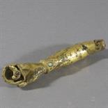 A GILT BRONZE ARM OF A BUDDHIST DEITY, Tibet, circa 16th century With turquoise inlaid bracelet,