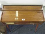 Miniature electric organ, in working order, walnut case, 3` long