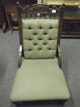 Late 19c walnut Nursing chair with button backed upholstery, turned front `supports