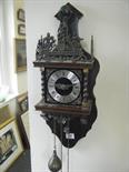 Twin weight driven decorative wall clock,