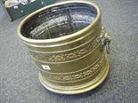 Late 19c brass log basket, on tripod feet with Lion head handles, 16" tall 12" wide,