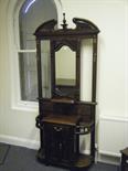 19c style large hallstand with centre mirror flanked by coat hangers, all above a section containing