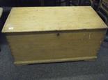 Mid-19c large pine blanket chest with a lift up lid, twin carrying handles, candle box to the