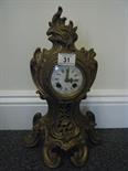 Art Nouveau Mantle clock 16" tall with gilt decoration scrolling Art Nouveau design body enamel dial