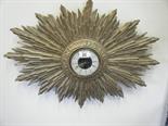 Sunburst wall clock with later quartz movement enclosed