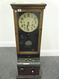 The Time recorder clock made by the National Time Recorder Company Limited of London in oak case