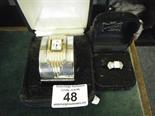 Art Deco design bangle watch, quartz movement, and a similar matching crystal glass silver and