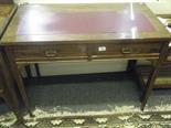 Edwardian period inlaid desk, on tapering supports, with castors 2 small drawers to front, in need