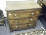 Early 19c chest of 3 graduating long drawers on shortened splay supports in need restoration and