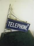 Vintage Blue enamel telephone sign on wall hanging bracket, 20"" x 10"" approx, double sided