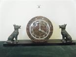 Art Deco inspired marble mantle clock, a centre circular clock section flanked by 2 Spelter figures