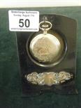 Silver h/m pocket watch stand, ebony with silver highlights, h/m rubbed but probably London 1900`s