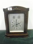 Arch topped mahogany cased Edwardian period chiming or silent mantle clock with an 8 day movement