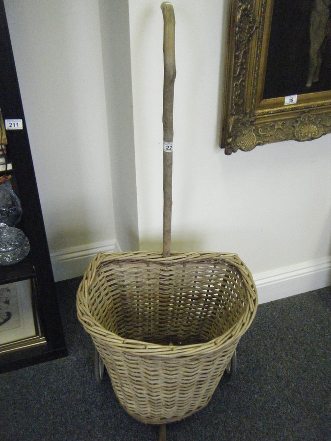 Vintage Wicker shopping basket, on pair of wheels with walking stick