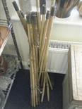 Set of old bamboo drain cleaners, 2 old spirit levels,