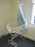 Late 19th possibly early 20th century Baby’s crib on stand, wrought iron, full restoration carried