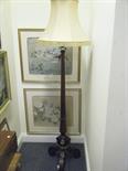 Good quality mahogany standard lamp with accompanying shade on tripod supports,