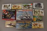 11x assorted plastic model kits (mixture of dinosaurs, military, boats, motorcycle, aircraft)