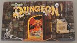 TSR Inc. The New Dungeon Game, containing 6 x purple figure, cards, 2 x dice, Rulebook and playing