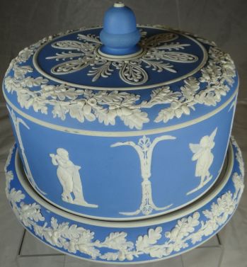 A Dudson Hanley blue Jasperware cheese dome, decorated with garlands ... A Dudson Hanley blue Jasperware cheese dome, decorated with garlands ...