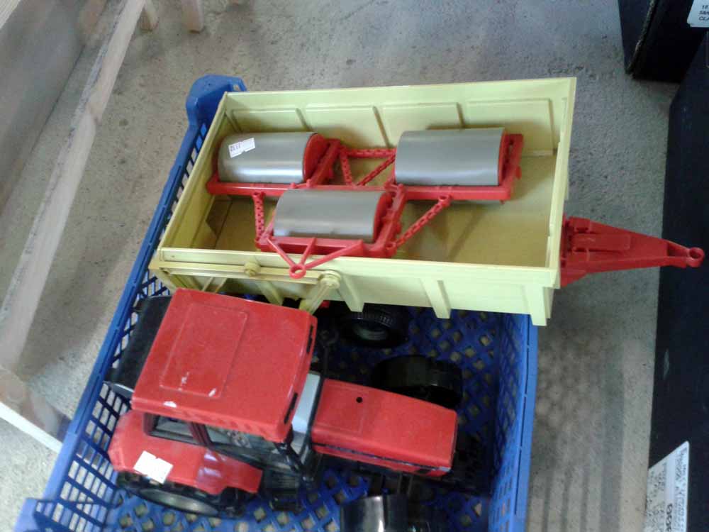 A Large Scale Bruder Maxxum Case 5150 Tractor With Tipper And 3 Roller