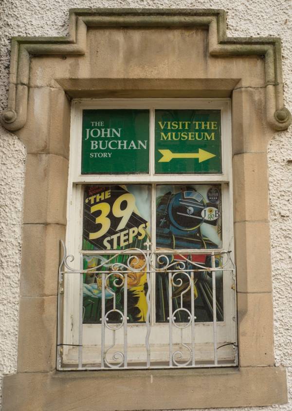 Image of John Buchan (1875-1940) was born in Perth and spent his childhood holidays at his grandparents’ house in Tweeddale, in the South of Scotland. This area had no small impact on Buchan – indeed, in 1935, after his election to the House of Lords, he took the name Lord Tweedsmuir. 

He was a prolific author, writing 130 books in total and contributing to a further 150, as well as producing essays, poems, articles, reviews, and journalism. His most famous works featured the character Richard Hannay, e.g. ‘The Thirty-Nine Steps’. 

Despite an international reputation and a life spent travelling Africa, Europe and North America, Buchan remained devotedly attached to Scotland. In his poem 'The South Countrie', as well as in many other works, he goes further, preferring the South of Scotland to every other part of Scotland. 

Don't forget to:
Check walk the John Buchan Way from Peebles to Broughton.
Or to visit Dumfries and Galloway - stay at Knockinaam Lodge where Buchan was a guest. The stream that runs past the lodge was the inspiration for the House that Hannay fled to away from the police in 'The 39 Steps'. 
Buchan explored Galloway and spent a lot of time cycling, covering 65 miles of the hills in 24 hours in 1897. Three novels (Dickson McCumm trilogy) and 1 short story are Galloway set. In Buchan's landscape "Portaway" is Newton Stewart, "Gledmouth" is Dumfries, "Castle Gay" is the Castle of Old Risk and "Fallatown" is Wigtown, as well as the district of Carrick in Galloway where the action for 'Huntertower' took place.