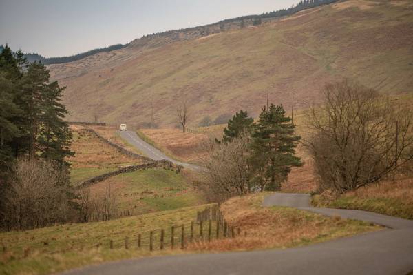Image of James Hogg was born in a small cottage on Ettrickhall Farm at the top of the Ettrick Valley in 1770. He was the second son of Robert and Margaret Hogg (nee Laidlaw). Robert Hogg tried farming but soon became bankrupt and at the age of six, James had to leave school to perform the most menial tasks of farm service. 

At the age of eleven, he became a shepherd watching the flocks as they grazed on the unfenced hills. While there, he practised reading with the encouragement and use of his master's library. By the time he was eighteen he could read proficiently, and write well but slowly at twenty-four. 

Although he had little formal education, Hogg was fortunate in his family connections. His mother and her family had a great fund of the oral traditions of the Border Ballads, the folklore and superstitions of the country people. His father was of Covenanting stock and from his side of the family, Hogg observed the effect of over-zealous Calvinism. 

This background was his basic material as a poet, storyteller and songwriter. 

With most of his life spent in the hill country, familiar stories, places and people appear in his works, often thinly disguised. Hogg was a collector of the oral and musical traditions of the Borders and when a young lawyer called Walter Scott was seeking fragments of ballads in the Ettrick Forest in 1801, it was little wonder that he asked Jamie the Poeter to be his guide. This was to be the start of a friendship which lasted until Scott's death in 1832. 
Hogg had published in his own right but Scott introduced him to the literary establishment of the Edinburgh Enlightenment. Soon Hogg was taking his place amongst them as their equal or even superior in published prose and poetry. 

His epic poems The Queen's Wake', Mador of the Moor and 'Queen Hynde' bear comparison to any, while his The Confessions of a Justified Sinner' is recognised as a major prose work of the century. 

Many of the literati of Edinburgh professed to look down on the unlettered countryman while still being envious of his talents. Hogg probably knew this and played up to his country shepherd image as he describes himself in The Queen's Wake. 

"But when the bard himself appeared, 
The ladies smiled, the courtiers sneered 
For such a simple air and mein 
Before the court had never been 
A clown he was, bred in the wild, 
And late from native moors exiled". 

As well as being a literary success, Hogg had a constant ambition to the higher praise in Ettrick Forest of being 'a farmer'. Here, he was much less successful; money made by his pen was lost in a series of farming failures. Such was his determination to be seen to have made good in the eyes of his neighbours, that when Sir Walter Scott obtained two seats for himself and Hogg at the Coronation of George IV in Westminster Abbey, Hogg refused on the grounds that it was at the same time as the great St Boswells Fair and no new farmer could afford to miss that. 

James Hogg married Margaret Phillips in 1820 at the age of fifty. When he died fifteen years later, he left a family of one son and four daughters. After a space of twenty years, his widow received a yearly pension of £100 until she died in 1870.