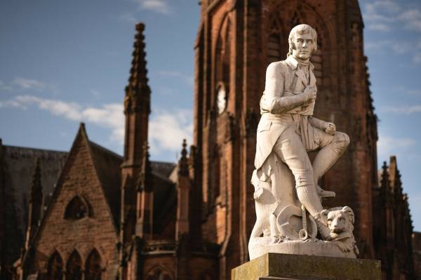 Image of Burns is very present in the South of Scotland,  he lived in and around Dumfries, and died and was buried in the town.  In his role as an excise man he will have visited many towns across the South but, as his celebrity rose, he dressed as a gentleman and was welcomed at tables across the region to entertain and amuse.  

We follow with some of the highlights and more amusing stories about Burns' travels in the South of Scotland. Dumfries is really all about Burns. If you like the idea of following a set route with insights into the poet’s life in Dumfries, there is a handy In the Footsteps of Burns town trail map with downloadable information! It starts from the Tourist information point: https://www.burnsdumfries.co.uk/

When you reach Dumfries, you will find that all the points of interest are within a short walk of each other and there is plenty of free parking in the town.