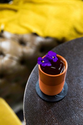 The Lobby Bar Shakes Up a New Cocktail Menu cocktail with flowers