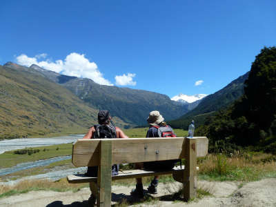 Rob Roy Glacier climbers pause in a bench and admire view