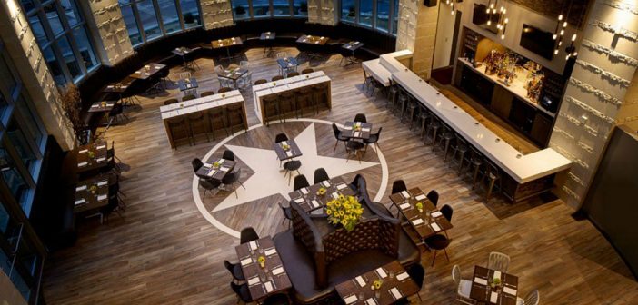Texas Chic – The Archer Hotel Austin The Archer Hotel Austin showing the lone star in the bar room floor