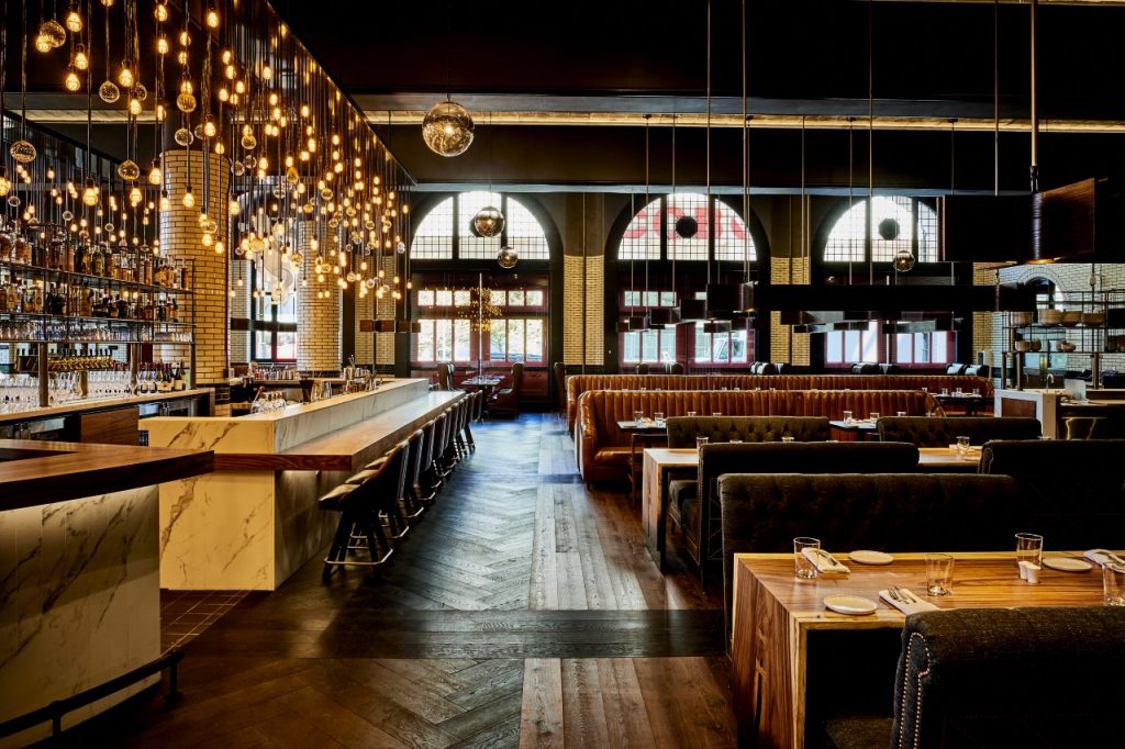 The Apparatus Room at The Detroit Foundation Hotel bar and booths