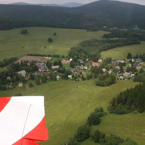 Aerial view of the municipality with traces of mining activities in the surroundings. 