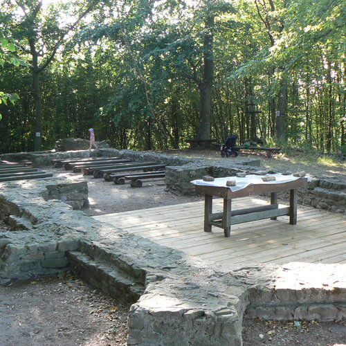Above-ground reconstruction of the church foundations, where religious services and pilgrimages still take place today.