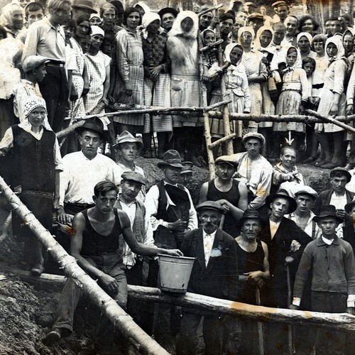The search for Methodius’s grave at the Hroby site in 1932. The arrow marks the local villager Klementina Maštalířová, who initiated spontaneous digging down to a depth of 5 metres.
